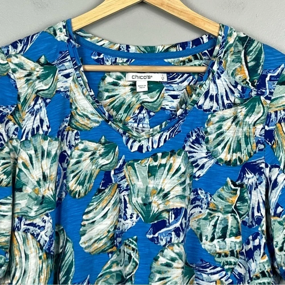 Chico’s blue cotton modal she’ll print v-neck hi-lo hem t-shirt top, medium.